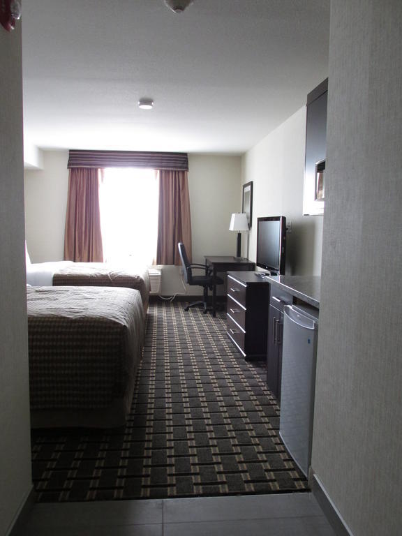 Sigma Inn & Suites Melville Room photo